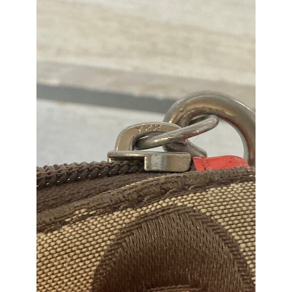 COACH SMALL SIGNATURE PRINT CANVAS, ORANGE TRIM WRISTLET. - Picture 9 of 11